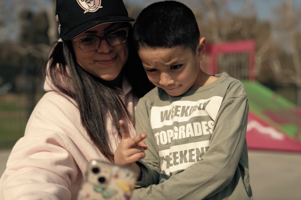 Stephanie Reyes and her son taking a selfie.